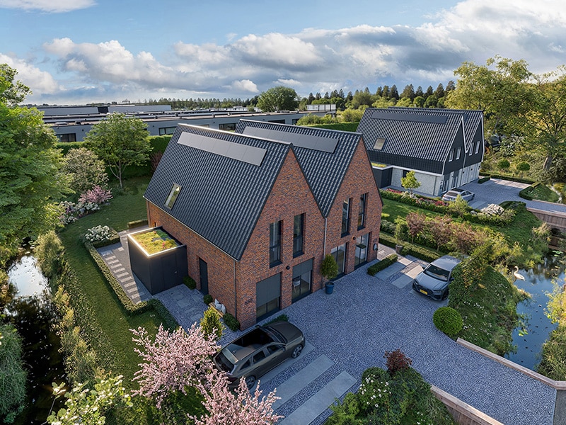 Twee moderne nieuwbouwwoningen met tuin en water in groene omgeving